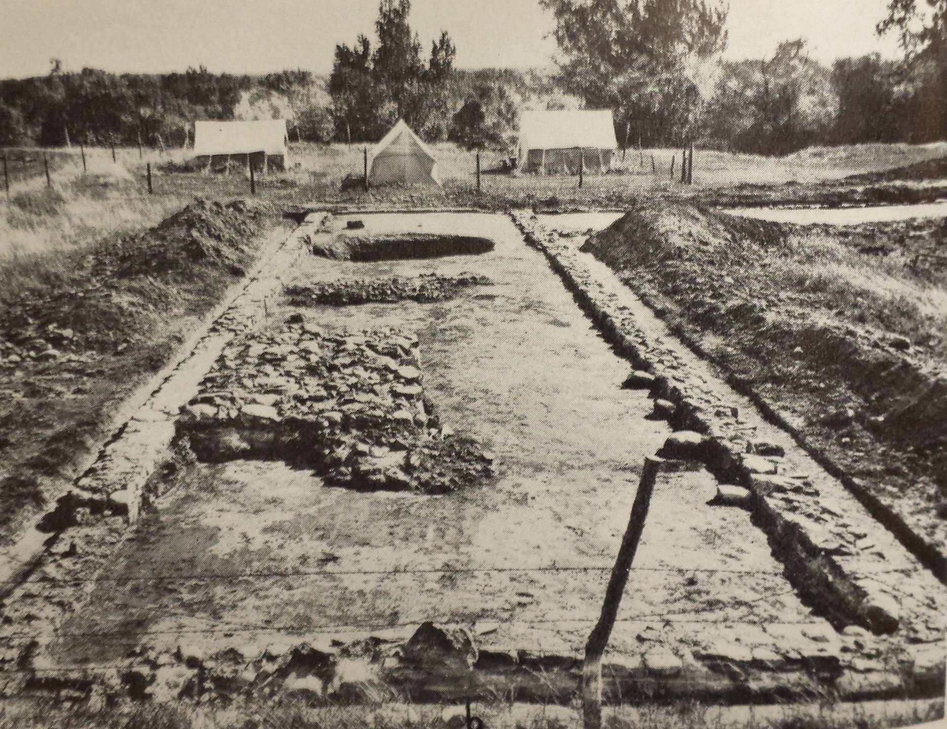 Black-and-white photo of the excavation of a 19th-century military fort.