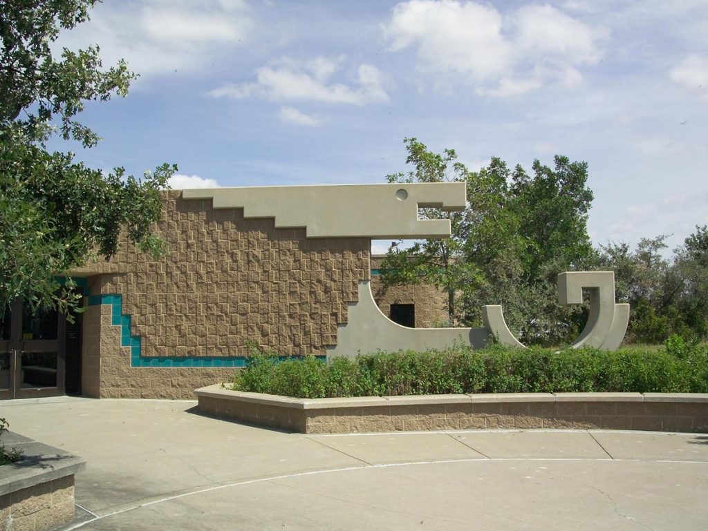 Exterior of the visitor center building. It includes decorative architectural elements