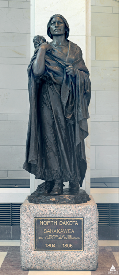 Bronze statue of a woman with an infant on her back.